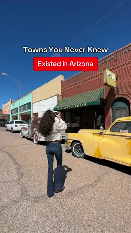 A post by @welcometoarizona on TikTok caption: Have you been to this vintage town in Arizona? 🚗🕰️ Lowell is a nostalgic trip to the 1950s! The majority of the town was lost to the Lavender Pit’s mining operations, but Erie Street was saved, and now stands frozen in time! Explore vintage cars, antique signs, and more on this unique Arizona roadtrip #welcometoarizona #travel #2025 #hiddengems 