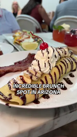 A post by @hungryhotline on TikTok caption: If you’re looking for an incredible brunch spot in AZ, look no further! Not only is @jojo.coffeehouse super cute inside but the food is delicious! They have so many great new items on the menu for Summer like the Banana Split Crepes, Sunrise Tostadas and the Raspberry Lemon Pancakes- THESE ARE AMAZING!! Make sure to try their Summer Mimosa Flight too! Let us know if you stop by to check it out!  📍JOJO Coffeehouse 3712 N Scottsdale Rd Unit 110 Scottsdale, AZ  85251 #brunch #az #arizona #scottsdale #pinacolada #pancakes #breakfast #brunchspot #bestbrunch #azfood #scottsdalebachelorette #reels #mimosaflight #crepes 
