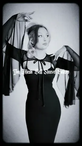 A post by @foxbloodshop on TikTok caption: Our popular Bell Sleeve Bolero now in MESH! #gothfashion #gothicgirl #gothtok #styleinspo #vampiregirl #witchyvibes