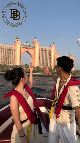 A post by @marcdanielbernardo on TikTok caption: Adventures are always better at sea. 🌊 Especially in Dubai! 🚤 @theblackboats #MarcDanielBernardo #Lynni #LYNNIxDANIEL #TheBlackBoatsDubai 