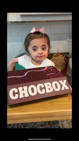 A post by @ourlittlemms on TikTok caption: They really said this Dubai Chocolate Bar is too good to be shared Mama 😂 @CHOCBOX ✨ #funny #funnyvideos #foodie #foodlover #asmr #mukbang #dubaichocolate #chocbox #chocboxla #sweet #yummy #nosharing #twins #fyp #foryoupage 