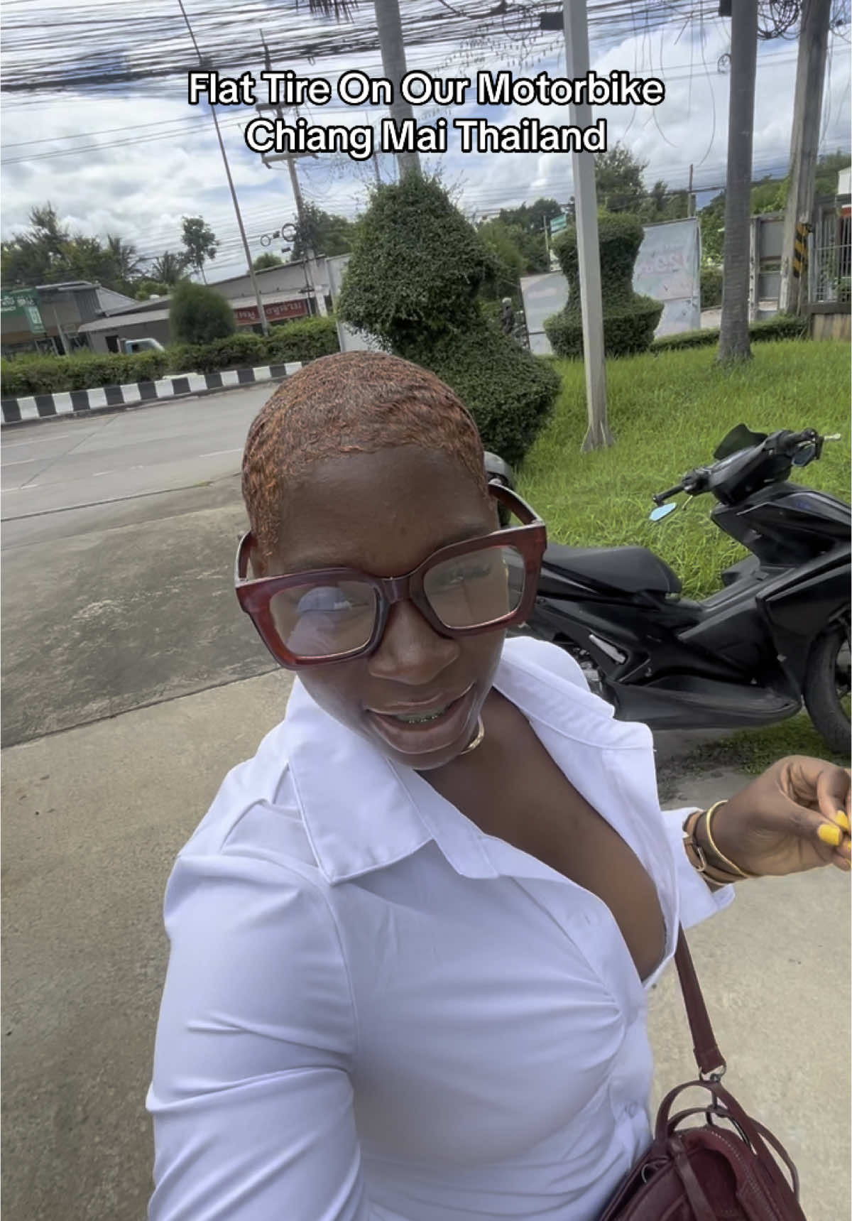 A post by @miraspiveytravels on TikTok caption: Stranded in Chiang Mai with a Flat Tire & Good Vibes 🛵🌴🇹🇭 #thailand #livinginthailand #chiangmai #fyp  #flattire 