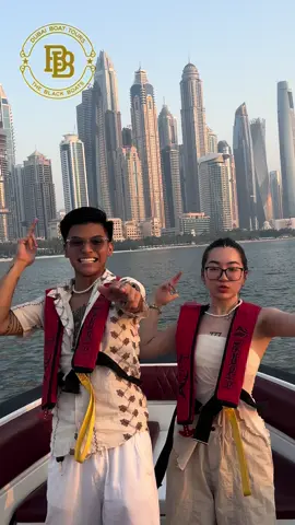A post by @marcdanielbernardo on TikTok caption: Speeding through paradise. ☀️🚤🌊 @theblackboats #MarcDanielBernardo #Lynni #LYNNIxDANIEL #TheBlackBoatsDubai 