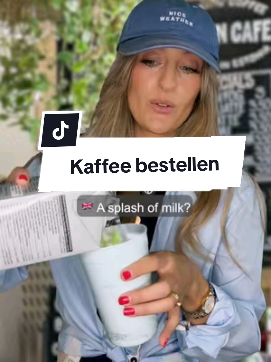A post by @deutsch_eins on TikTok caption: 🇩🇪 Kaffee bestellen - Wortschatz: der Pfandbecher/Mehrwegbecher der Strohhalm/der Trinkhalm der Deckel der Schuss Milch 🇬🇧 Ordering Coffee - vocabulary: reusable (deposit) cup straw / drinking straw lid a dash of milk