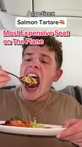 A post by @tommywinkler on TikTok caption: Replying to @zequil1 The total price at the end makes it a little less worth it😳 #fly #business #class #thefoodguy #tommywinkler #foodiefam #expensive 