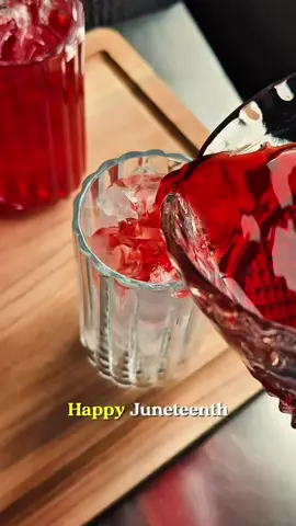 A post by @blackfoodiefinder on TikTok caption: 🤔 Did you know? 🥤⁣ ⁣ Red drinks have been stereotyped and mocked, but the truth is—they’re rooted in tradition. ⁣ ⁣ For Juneteenth, red symbolizes the bloodshed of our ancestors and the resilience of freedom. From hibiscus to kola nut to kool-aid, red drinks carry history, not just flavor.⁣ ⁣ What red drink takes you back to your childhood? 👀⁣ ⁣ ⁣ #BlackFoodieFinder⁣ ⁣ #blackfoodie #blackfoodies #heyfoodies #everybodyeats #juneteenth #happyjuneteenth #juneteenth2025 #blackculture #blackhistory #hibiscus #hibiscustea