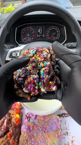 A post by @moeeatss on TikTok caption: Trying these 30g protein brownies from @Swolesweetsllc 🧁🍫🔥 #mukbang #asmr #canadaeats #food #Foodie moe eats #yummy #cheese #chicken #wings #usafoodie #canada #usa 