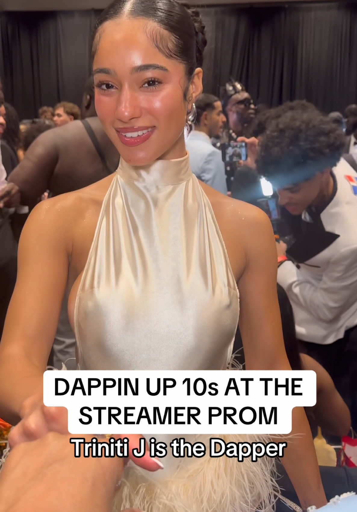 A post by @iamtrinitij on TikTok caption: Dappin up 10s at Funny Mike’s streamer prom. #trinitij #iamtrinitij #streamers #streamerprom #fyp 