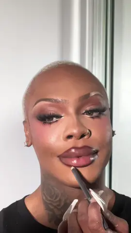 A post by @chrismychael1 on TikTok caption: YOU ASK & YOU SHALL RECIEVE 🙌🏽!  Here is a full makeup tutorial on the makeup i did in my most recent “ transition “ tiktok 🤗😇 . Leave a comment & lmk how you all feel about these kind of tiktok? Want more ?? PRODUCT BREAKDOWN : Skin prep : @elfcosmetics poreless primer  @ONE SIZE BEAUTY secure the sweat  Eyebrows : @Huda Beauty  “ Medium Brown” brow pencil   @Juvia’s Place  “ Soft brown “ brow gel  @Nars Cosmetics “ biscuit “ soft matte concealer  BASE : @Maybelline New York PH  @NYXCosmetics  @ elf halo  glow bronzer  @elf  blush  Setting Powders:  @maybelline loose setting powder  Bronzer : @NYX butter bronzer  Blush : @NYX butter blush  Lashes : @tattilashes   Lips : @maccosmetics “ Root for me” & “ Myth “ lipstick