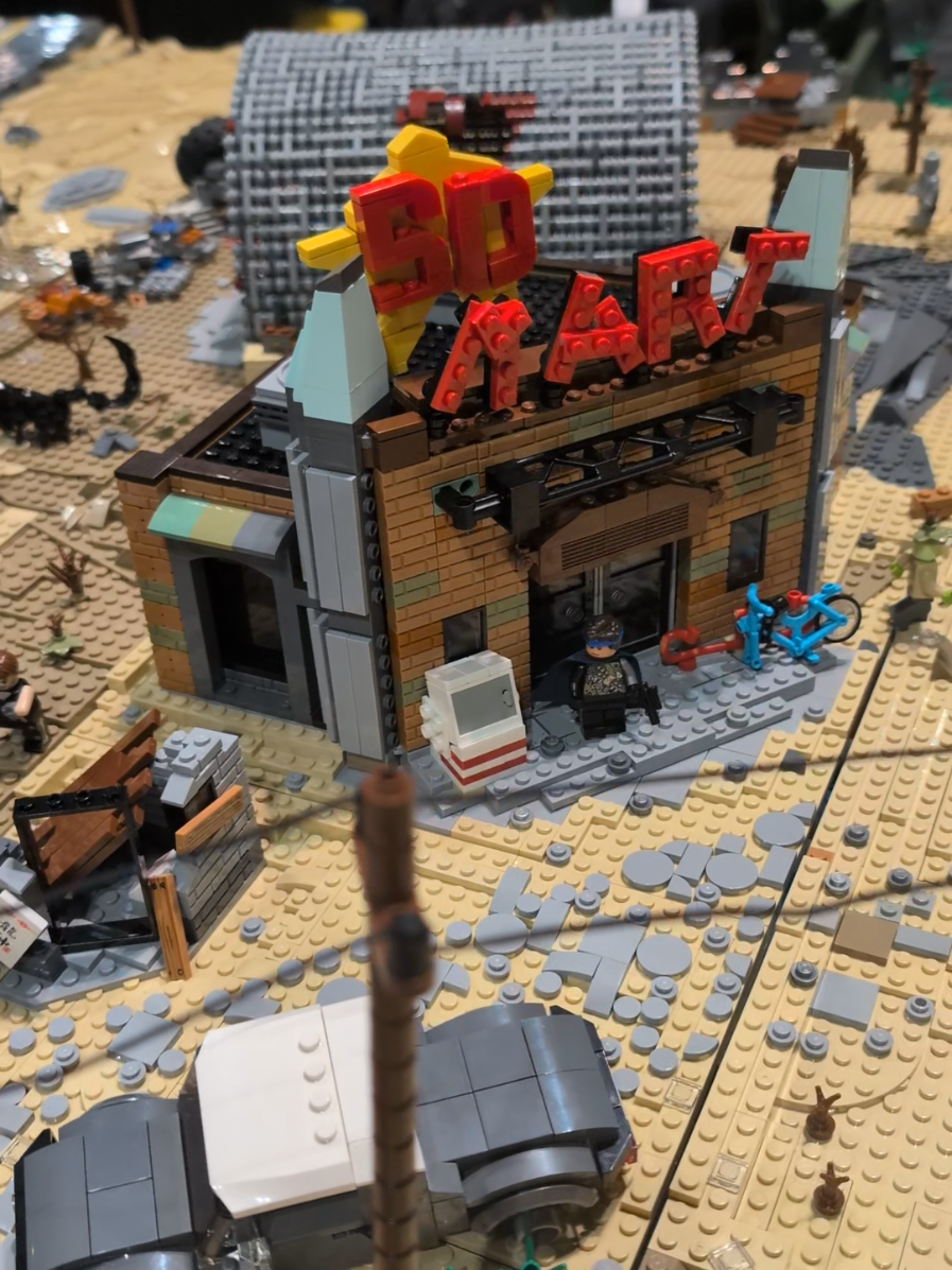 A post by @beyondthebrick on TikTok caption: Huge LEGO Fallout at Brickworld Chicago 2025 #lego #fallout 