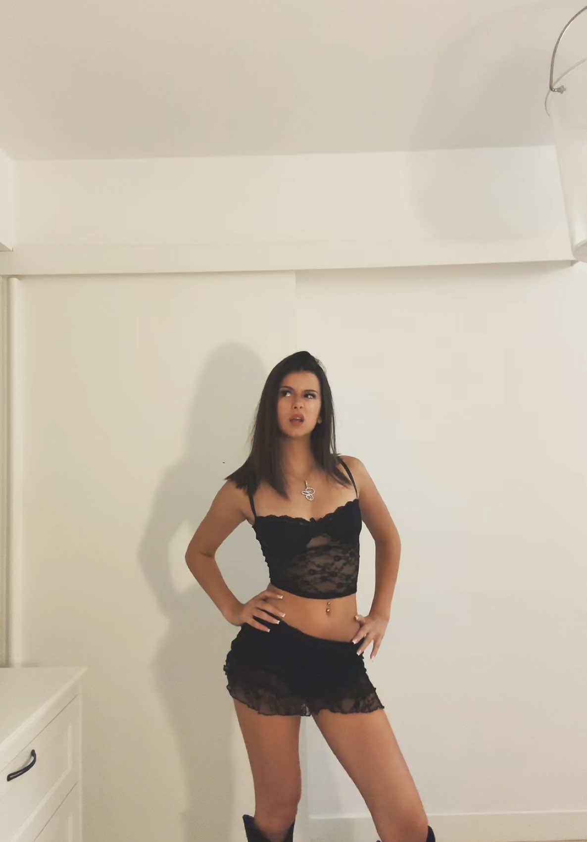 A post by @carlottacorsiniii on TikTok caption: 🐈‍⬛☕️🕷️♠️