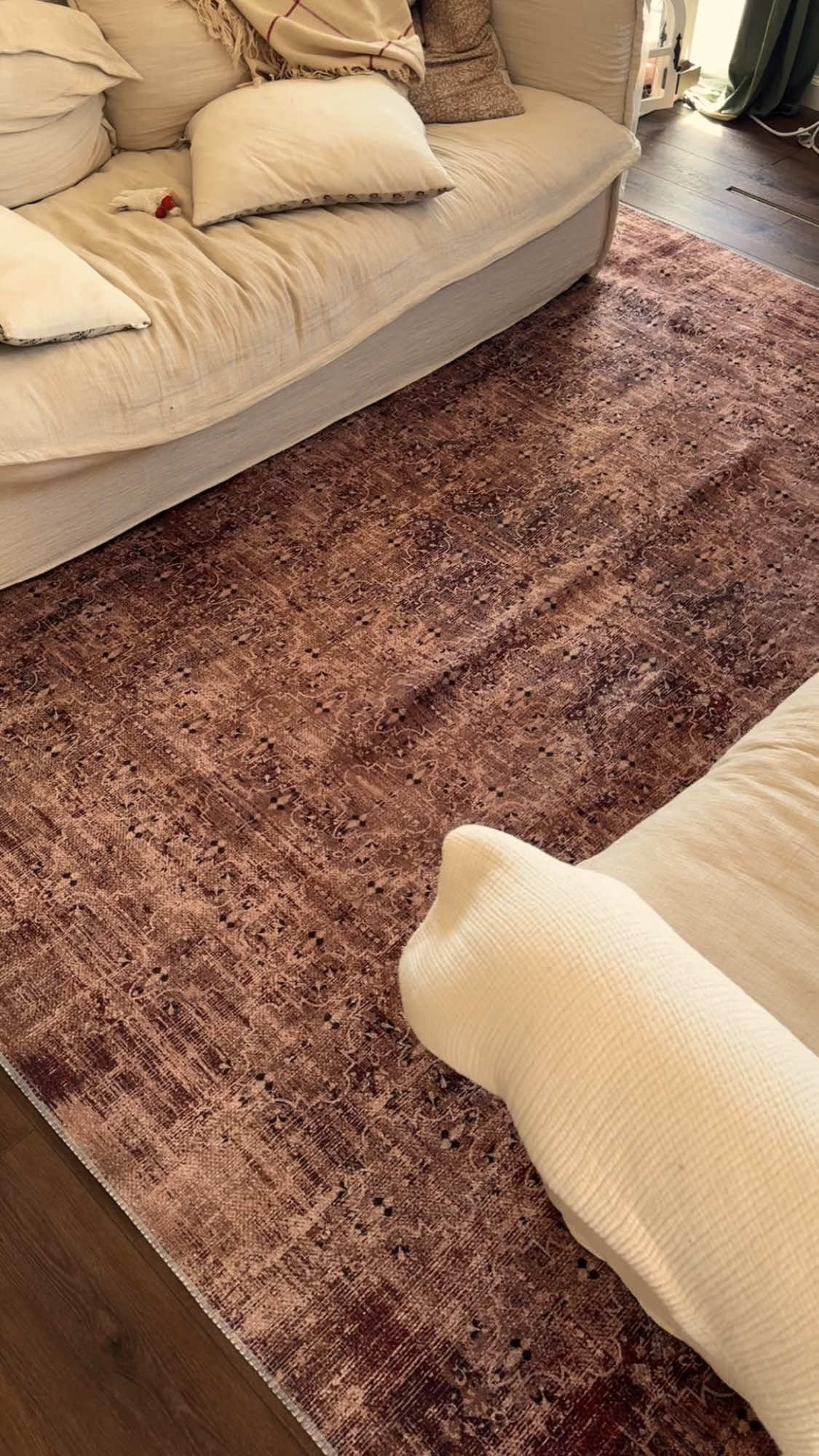 A post by @mrsmckennabarry on TikTok caption: I was so excited about this rug, because I had been scouring the internet for literally almost a year trying to find the perfect reddish brown square rug for our living room and I think it might look too pink 😭 Should I dye it?! HELP. I feel like it’s so hard to find a muted reddish brown rug that doesn’t have strong pink undertones. #rug #newrug #homedecor #interiordesign #livingroomdecor #fyp #foryou #foryoupage 