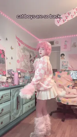 A post by @strawbabyboy on TikTok caption: the cat boy population has been on a decline but we are so back #femboy #fyp #femboytiktok #pink #kawaii #strawberry #fypシ #femboyfriday 