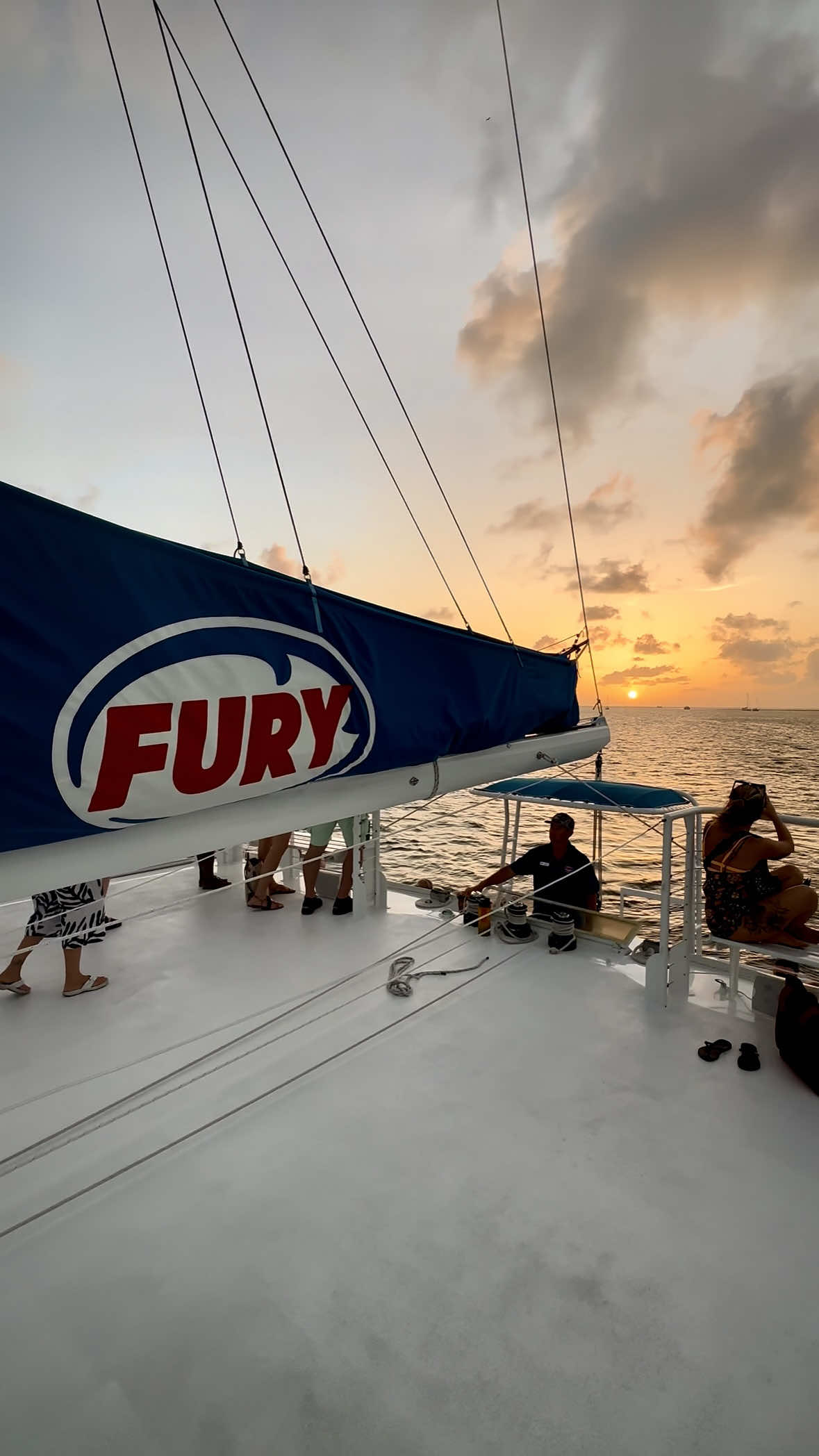 A post by @thingstodo.florida on TikTok caption: Take in the Commotion on the Ocean with Fury Key West!  Sail into the sunset on a catamaran with live music, dancing, light appetizers, margaritas, and more while sailing off the shore of beautiful Key West. Next time you’re in Key West looking for an exciting evening on the water, check out @Fury Water Adventures Key West and hop on their Commotion on the Ocean excursion! 🤩🏝️⛵️ • • • • • #keywest #keywestlife #floridakeys #sail #sunset #sunsetcruise #excursion #islandlife #thingstodoinkeywest 