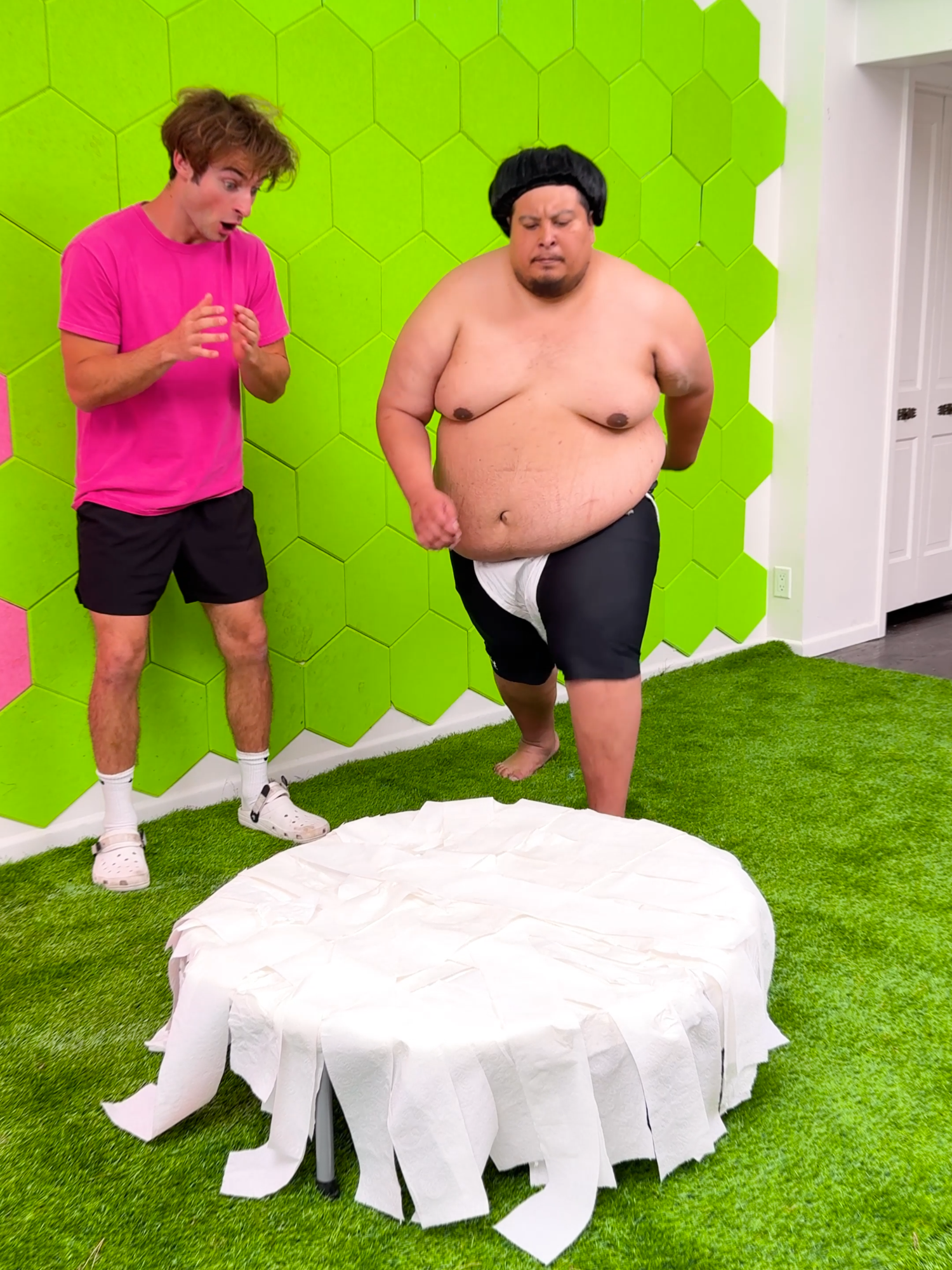 A post by @topperguild on TikTok caption: Can Toilet Paper Hold a Sumo Wrestler?