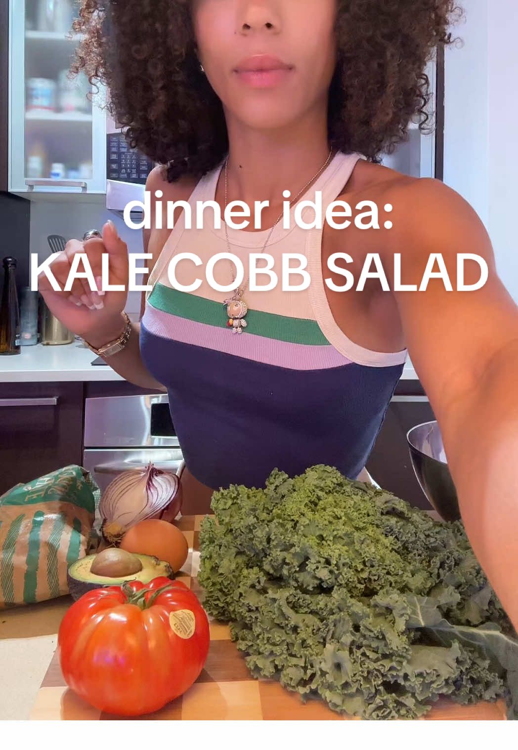 A post by @thekaylaramos on TikTok caption: Kale Cobb Salad with Shrimp and Chicken Sausage: (this is a very flexible recipe, adjust anything to your liking/availability) 1/2 a bundle of kale 1 heirloom tomato 1 egg 1/8 red onion 1/2 an avocado 1 slice of pepper jack cheese a handful of pickled jalepenos 1/4 lb of shrimp 1 chicken sausage link sauce:: greek yogurt garlic mixture (greek yogurt, a few garlic cloves diced of grated, 1/2 a lime and salt. adjust to taste) 1 ranch packet a teeny bit of dijon mustard  1/2 a lime black pepper (no added salt) pan sear until brown and crispy