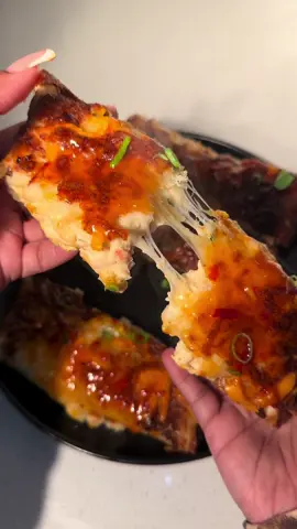 A post by @cookingwithdestiny_ on TikTok caption: Crab Rangoon stuffed cheesy bread 🦀🥖 Inspo: @Reachel 🌺 