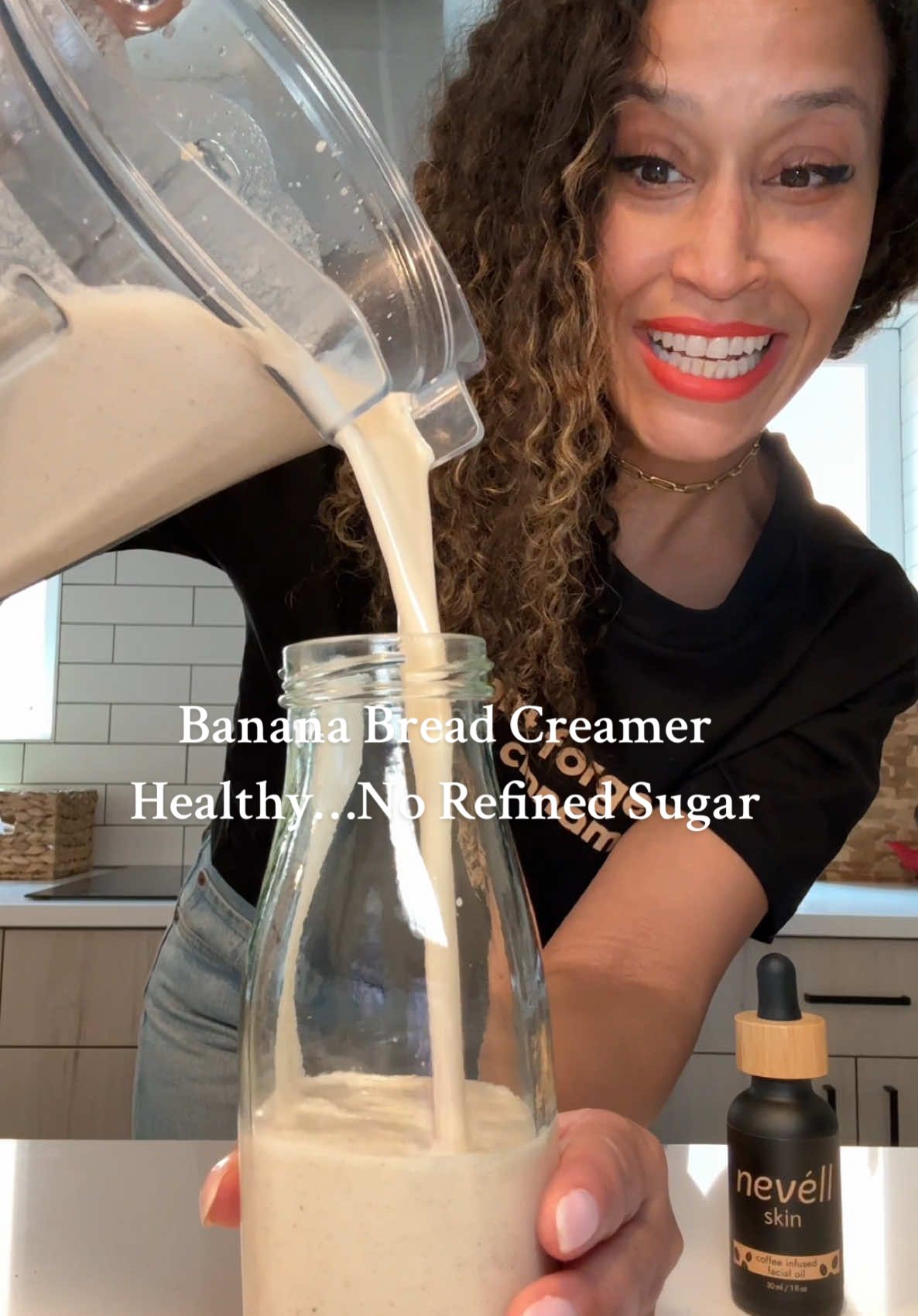 A post by @thejenjones on TikTok caption: Banana bread iced latte! Use BDAY20 and save 20% off @nevéll_skin/ Coffee Infused 5 ⭐️ reviewed coffee oil for glowing skin! The only moisturizer I use! Grab your bottle at nevellskin.com  Banana Bread Milk: 1 overripe banana 2 cups coconut water 1/2 cup raw soaked walnuts  1 tsp vanilla 3 pinches of salt Ceylon cinnamon and nutmeg