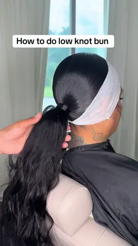 A post by @donesharenae on TikTok caption: Part 2 on how to do the low knot bun, follow me for more tutorials 🫶🏽💕 #ClevelandHairstylist #SleepPonytail #sleekpony #knotbun #hairtips #hairtutorial 