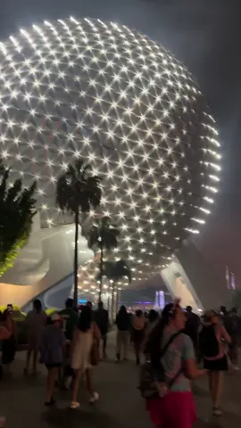 A post by @logandurrance12 on TikTok caption: Y’all come spend the evening at Epcot with the Durrances! #dadsoftiktok #disney #epcot 