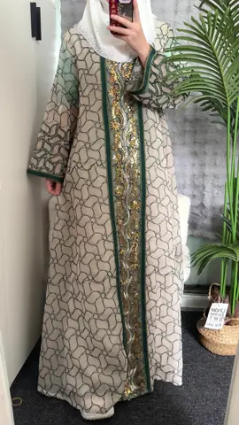 A post by @meowfashion666 on TikTok caption: #Spotlight#TrendNew#abaya#OOTD#TikTokMakeMeBuyit #IGotItFromTikTok #TikTokShop #Fashion2025 #Arabic #Tiktok #Minimalist #Muslim #cardigan #uk #OOTD #abayaonsale #arabiandress #NewArrivals#springsale#TikTokMadeMeBuylt #abayastyle #hijabstyle #womenswear 