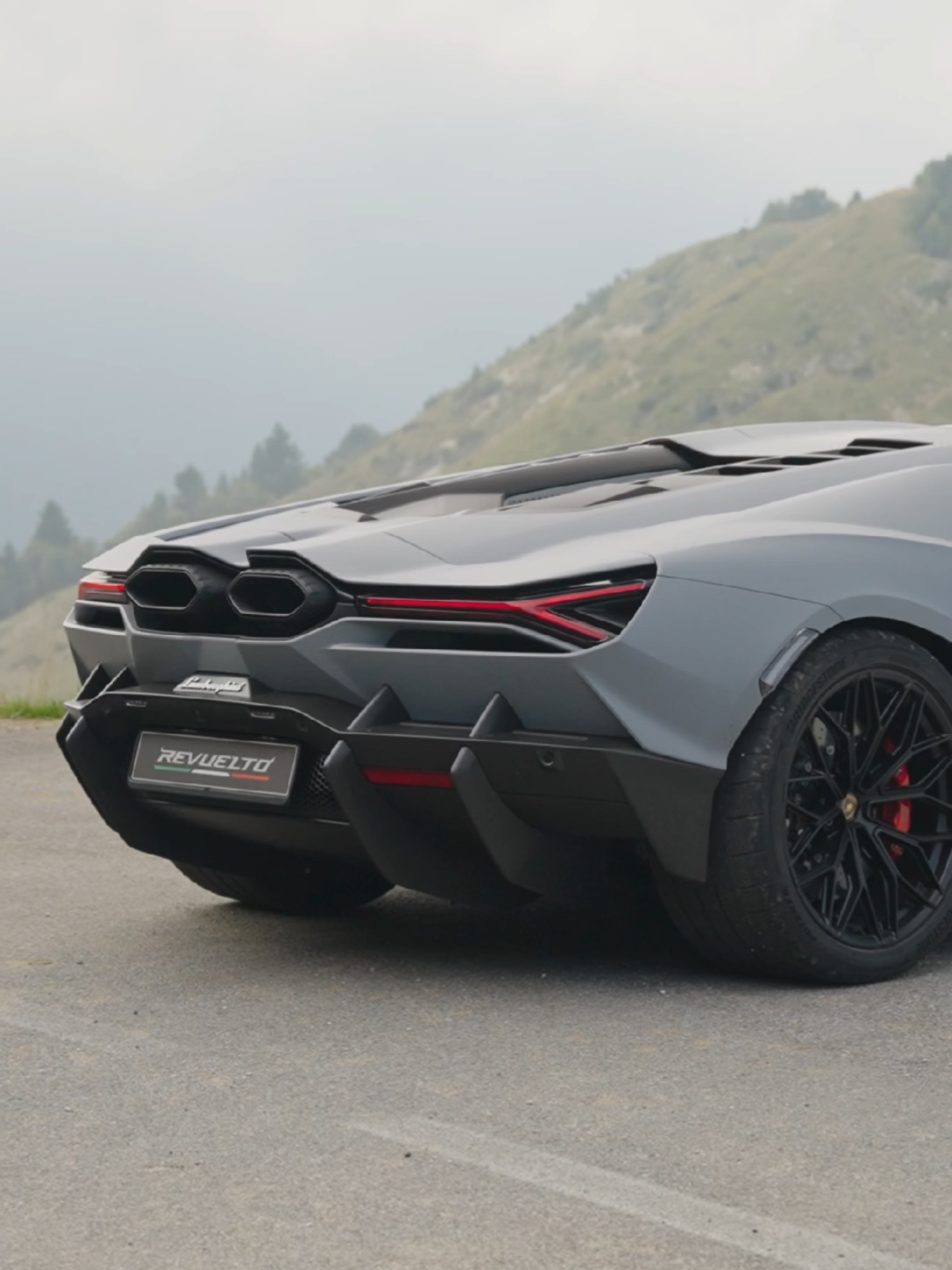 A post by @lamborghini on TikTok caption: Lamborghini Revuelto is a burst of energy, even when it is standing still. #Lamborghini #Revuelto #FromNowOn