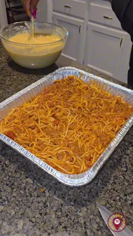 A post by @blackfoodiefinder on TikTok caption: The Viral Cornbread Spaghetti dish 🍝🍞 🤔 Would you try this recipe? 👀 ⁣