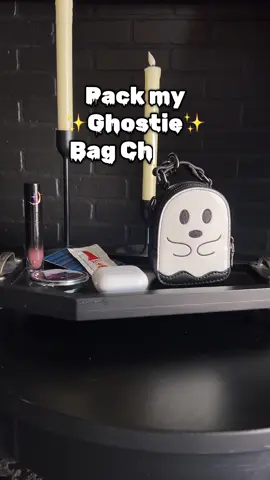 A post by @backstitchbruja on TikTok caption: Bag Charms drop TODAY for preorder. Turnaround time 13 weeks. Link to website in bio #backstitchbruja #spooky #halloween #paranormal 