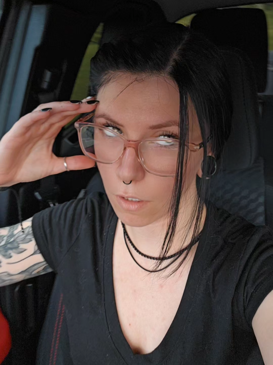 A post by @tingles34 on TikTok caption: Kinda sorta feels like... Day 11 of this work stretch! HAPPY FRIDAY ✨️  #fyp #tattoos #foryou #glasses #viral #tingles #alt #xybca #tatted #inked #gauges #blackhair 