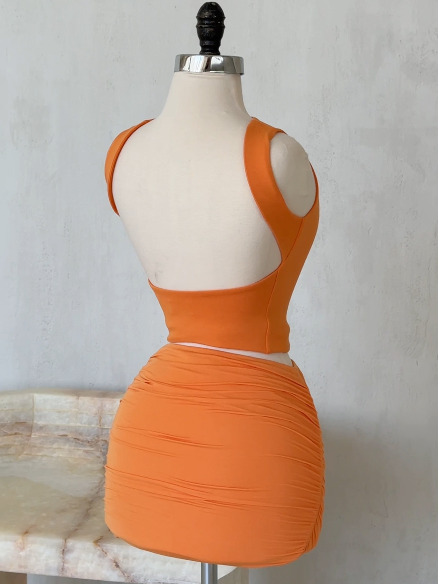 A post by @ohpolly on TikTok caption: Citrus colours all summer long.... 🍊🍋🍋‍🟩 #ohpolly #ohpollydress #outfitinspo #vacation #eurosummer #minidress #orangedress