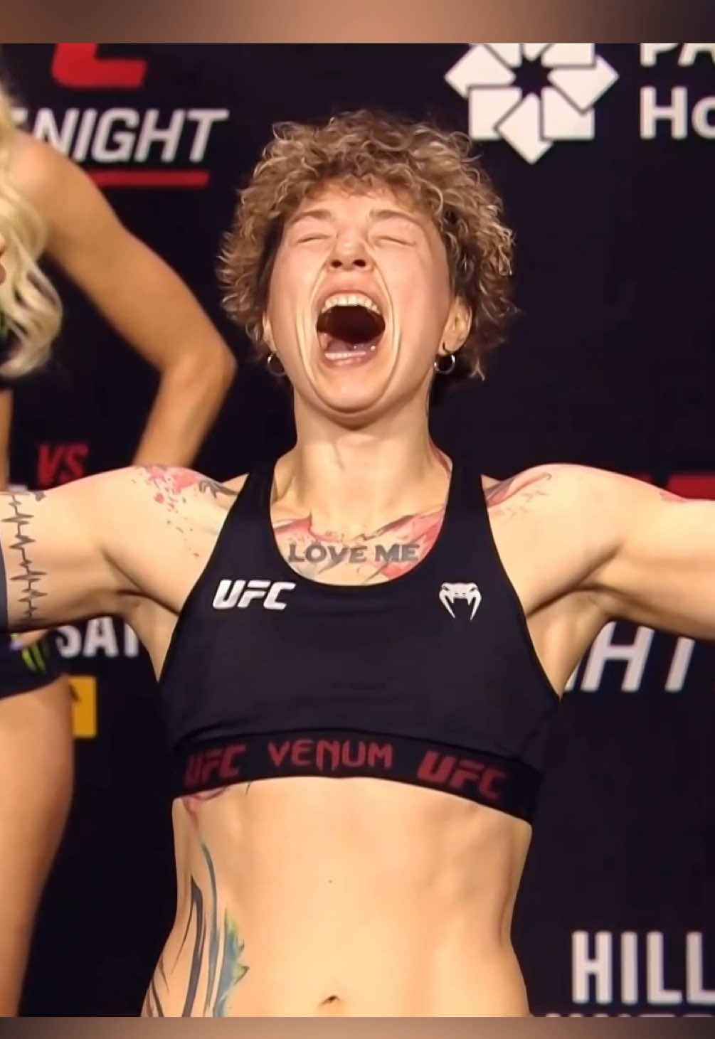 A post by @ufceurasia on TikTok caption: Ирина Алексеева заряжена на 200% 😄 #UFCBaku #UFC #MMA #facetoface #staredown #energy #emotions #rage 