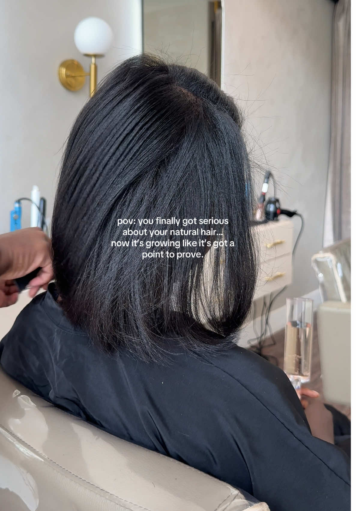 A post by @ on TikTok caption: one of my main priorities has been to grow my hair back and it’s grown 5 inches in the last 7 months. It’s been a journey. Bra strap here we come. #hair #hairgrowth #4chair #haircut 