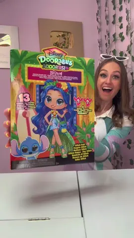 A post by @rhia.official on TikTok caption: Let’s unbox a GIANT Mystery STITCH box with 13 SURPRISES!!🫢🌺🌊⁉️ #asmr #foryou #liloandstitch 