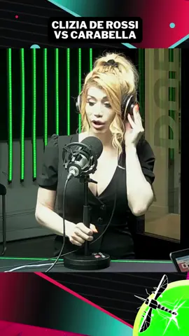 A post by @lazanzaraofficial on TikTok caption: A La Zanzara, Simone Carabella vs Clizia de Rossi #cruciani #radio24 #lazanzara