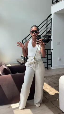 A post by @awilkyy on TikTok caption: Loveeee linen pants! It really feels like summer now!! 🤩✨ outfit is linked but here are the details… Top: Mango  Pants: Aritzia  Shoes: Margiela Tabby  Bag: Jacquemus  Sunglasses: Bottega   #foryou #fyp #ootd #outfitinspo #outfitideas #blackgirlluxury #simpleoutfit #linenoutfits #casualoutfits #trending #viral #blackgirltiktok 