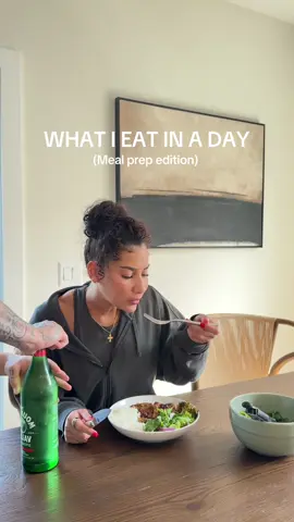 A post by @analiscruzx on TikTok caption: What I eat in day, no snacks.. details below🫶🏼 Meal #1 Steak + eggs + avocado side with grapes and strawberries, with @Bloom Nutrition powdered greens  Meal #2  Cilantro lime chicken + rice + broccoli + salad  Meal #3 prep seasoned salmon + golden + asparagus  hydrating throughout the day & making sure I’m drinking water😭 #bloompartner 