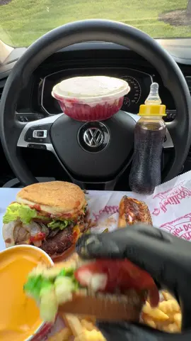 A post by @moeeatss on TikTok caption: Trying Portillo’s for the first time 🍔🌭🔥 #mukbang #asmr #canadaeats #food #Foodie moe eats #yummy #cheese #chicken #wings #usafoodie #canada #usa @portilloshotdogs 