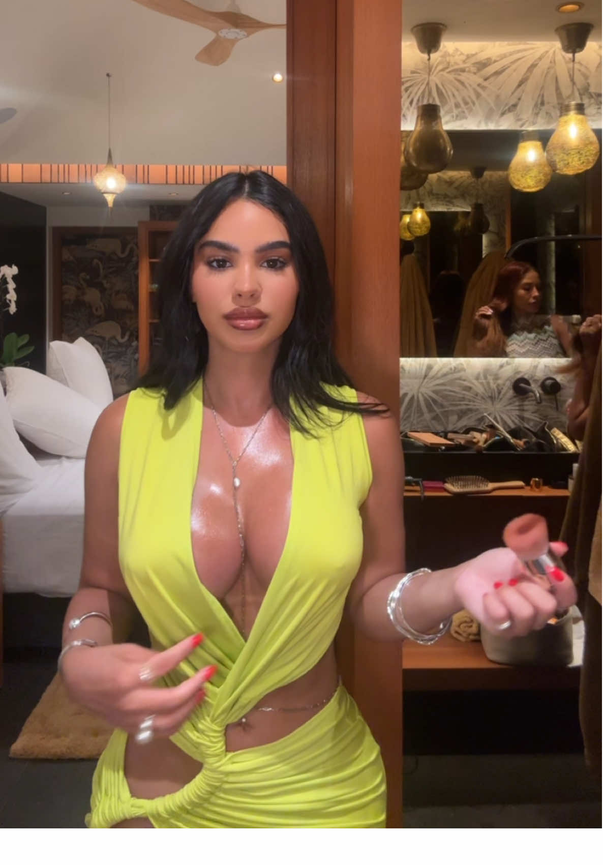 A post by @amayaliacolon on TikTok caption: This body glow is insane ✨✨✨✨ @Fenty Beauty 