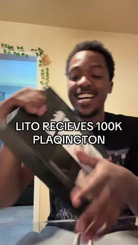 A post by @thehustleroftheyear on TikTok caption: 100 K NEXT STOP 1 Million!! Show Lito some love!!! #100ksubscribers #PLAQUE #Takeover #TakeoverBarsBattleLeague 