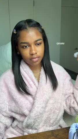 A post by @charismastev on TikTok caption: closed my curtains in the middle of this bc i was burning up 😭💔 #grwm #makeup  brands — @Thayers milky toner  @elfcosmetics primer  @Rare Beauty eye patches + spray  @Saie bronzer / blush  @Hourglass Cosmetics blush @Bobbi Brown concealer  @Huda Beauty setting powder  @NYX Professional Makeup brow tint pen @Patrick Ta Beauty pressed powder  @ONE SIZE BEAUTY setting spray 