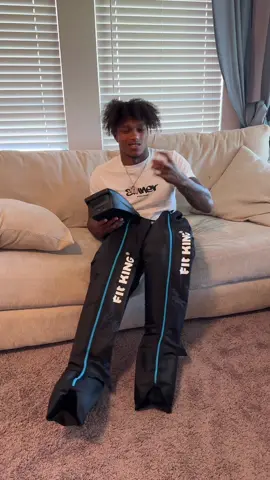 A post by @makayla.domagalski1 on TikTok caption: No way he just stole my package😭😂 @FIT KING use code: FITKING15 for money off🥳 #fyp #fitking #Love #fun #couplegoals #cute #viral #fun #legmassager #fitkinghealth #funny #viral #Relationship #trending #mad 
