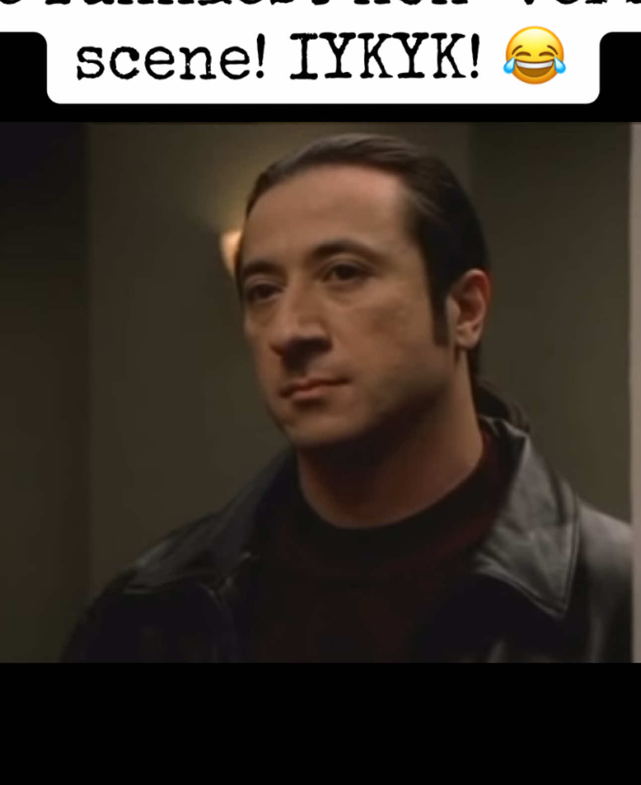 A post by @thebudgetballer on TikTok caption: Furio at Jean-Philippe’s door: the best non-verbal moment in The Sopranos. No words needed; his silence says it all. When JP opens that door and sees him, you feel the doom. Two seconds of pure, wordless storytelling. Iconic. #TheSopranos #Furio #HBOClassic #TVGold #MafiaMoments #SopranosHumor #SilentButDeadly #TonySoprano #MobLife #JeanPhilippe #TVHistory #IconicScenes #HBO #SopranosSunday #Cinematic