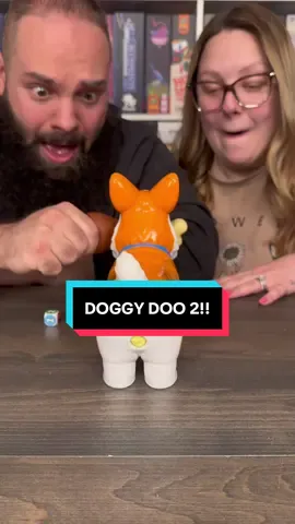 A post by @games4two on TikTok caption: A Board Game That Poos?! Play Doggy Doo With Us! #boardgames #GameNight #couple #fun 