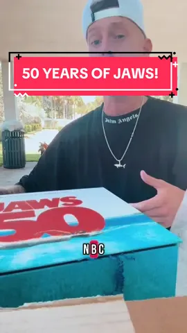A post by @scubadan_ on TikTok caption: To celebrate the 50th anniversary of JAWS Scuba Dan was sent a JAWS-DROPPING 50th anniversary JAWS mailer curtsy of NBC Universal 🙏 🦈  LETS OPEN IT!  JAWS 50 streaming now on peacock! STREAM IT. OWN IT. WATCH IT!!! #jaws50  @Peacock @uniallaccess @NBC 