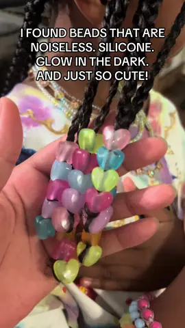 A post by @shashasvoice on TikTok caption: I found the cutest hair beads that are silicone, noiseless and so cute. These are the glow in the dark ones. My girls said they feel like gummy bears lol #hairbeads #hairaccessories #siliconebeads 