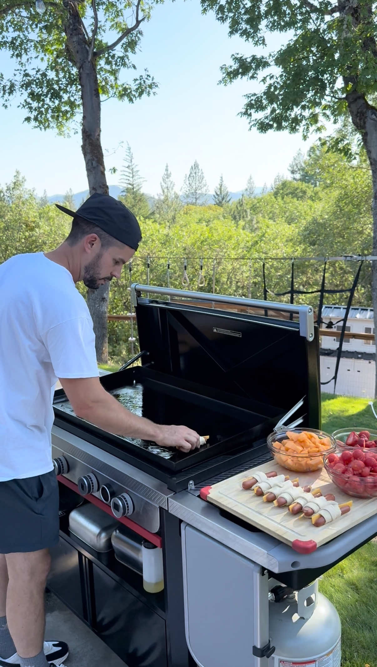 A post by @dadsocial on TikTok caption: #Ad I remember when my dad used to make these for me as a kid! @Pillsbury has truly been a household classic for me! Head to Pillsbury.com for easy, affordable grilling recipes and follow Pillsbury on social. #Pillsbury #Sponsored