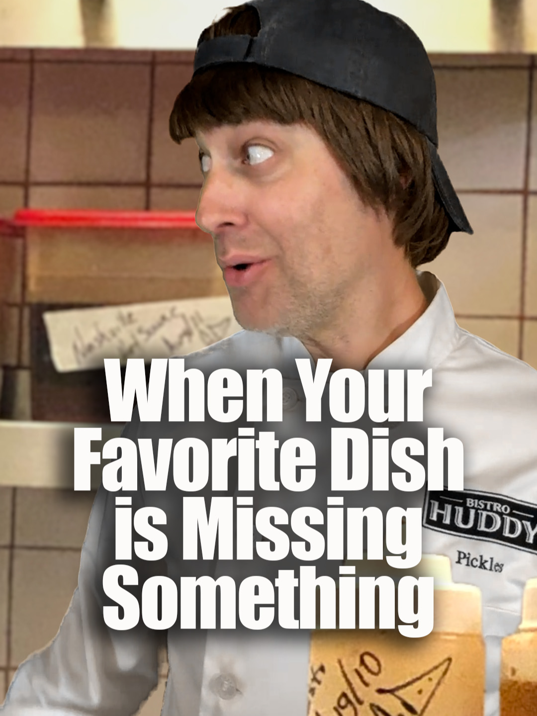 A post by @drew_talbert on TikTok caption: Don't go switchin' it up on Tim. He's fancy now. (co-write w/ @andrea.kelley) #restaurantcomedy #serverlife #bistrohuddy #cheflife