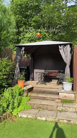 A post by @ccrystalx66 on TikTok caption: I am not built for the heat ☀️ 🥵 Not even a little! Thank goodness we have this gazebo from Amazon! I can shut whichever curtain puts me in the shade. And since it’s the solstice today it’s going to be a loonnggg day! I absolutely love this thing! I love it equally as much in the rain ☔️  #ad #amazon #gazebo #garden #paidlink #Home #gardendecor here’s a link to the gazebo if you’re interested! https://amzn.to/4kQouc7