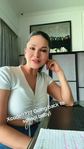 A post by @sunnyleone on TikTok caption: Going back to school To learn to code!! 