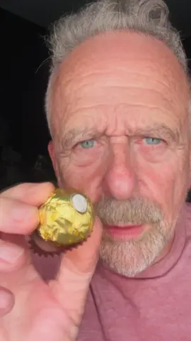 A post by @leelochip on TikTok caption: How to eat a Ferrero Rocher.
